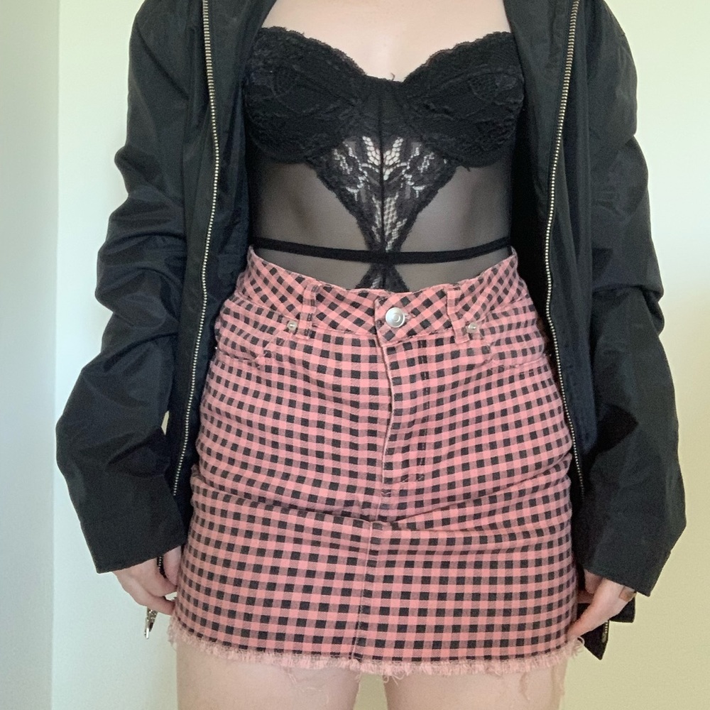 Pink and black checkered skirt